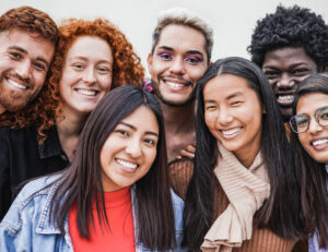Group of young multiracial people smiling on camera - Friendship and diversity concept